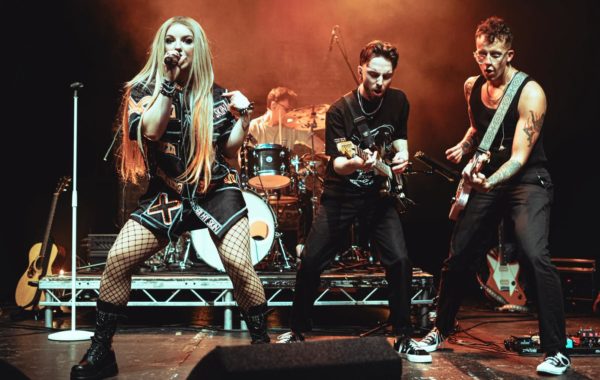 Courtnay Reddy as Avril Lavigne